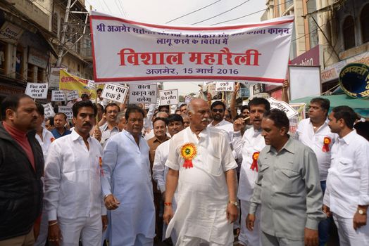 INDIA, Ajmer: Indian jewellers hold banners against the government during a protest against excise duties on gold in Ajmer on March 15, 2016.Jewellers across India are on an indefinite strike in a bid to force the government to shelve plans for a controversial excise tax announced in the annual budget 