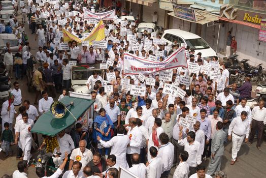 INDIA, Ajmer: Indian jewellers hold banners against the government during a protest against excise duties on gold in Ajmer on March 15, 2016.Jewellers across India are on an indefinite strike in a bid to force the government to shelve plans for a controversial excise tax announced in the annual budget 