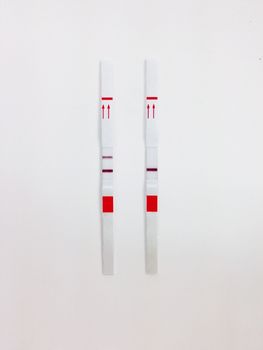 Positive and negative test cassette strips for analysis of HCG hormone or Negative and positive screening test casette strips for analysis of abused drug in the urine