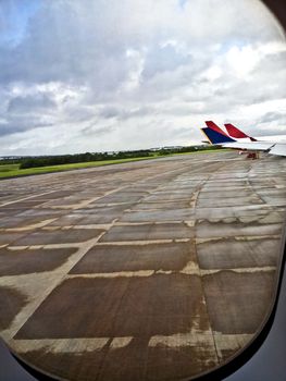 The view of parking apron inside aeroplane