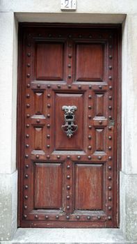 Detail of an old decorated wood door