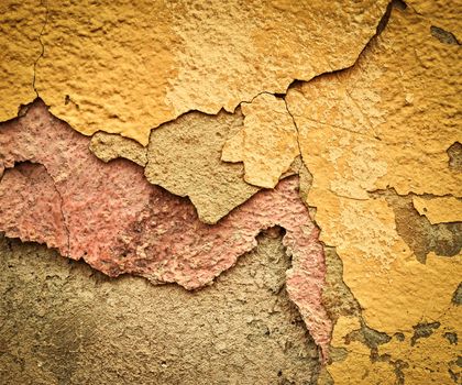 abstract background or texture old eroded plaster layer color