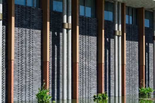 Facade of chinese building. Three materials consist of concrete, wood and brick