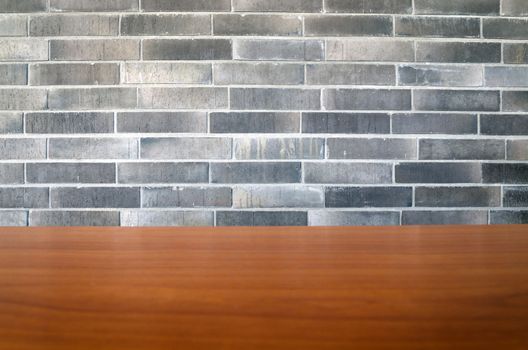 Brick wall texture with wood background. Focus at brick wall