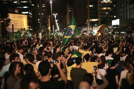 BRAZIL, Sao Paulo: Thousands gather on the Paulista Avenue, in Sao Paulo, during a pro-impeachment rally, on March 16, 2016. Outraged Brazilians protested in Brasilia and Sao Paulo following the release of a taped phone call between President Dilma Rousseff and her predecessor Luiz Inacio Lula da Silva. On Sunday, an estimated three million Brazilians flooded the streets in nationwide protests calling for Rousseff's departure.