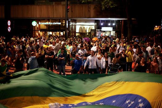 BRAZIL, Sao Paulo: Thousands gather on the Paulista Avenue, in Sao Paulo, during a pro-impeachment rally, on March 16, 2016. Outraged Brazilians protested in Brasilia and Sao Paulo following the release of a taped phone call between President Dilma Rousseff and her predecessor Luiz Inacio Lula da Silva. On Sunday, an estimated three million Brazilians flooded the streets in nationwide protests calling for Rousseff's departure.