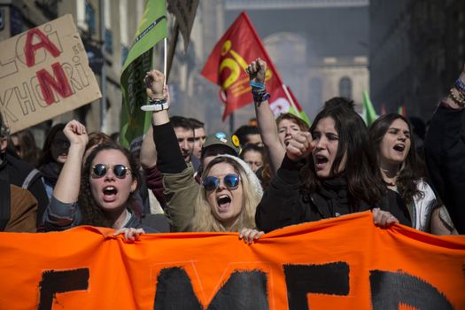 FRANCE, Paris: High school students and youths demonstrate in front of Rennes' town hall, western France,  during a protest march opposing the government's labour reforms on March 17, 2016. The contested reform is designed to inject more flexibility into the labour market by dropping key measures that would have benefited smaller companies. In a significant change from the original text, French Prime minister said on Monday that small and medium-sized companies would not be able to unilaterally introduce flexible work practices into their working week.