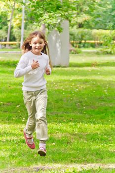 Photo of cute running girl in summer