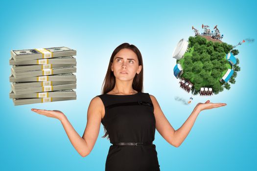 Businesswoman holding cash and earth globe, saving planet concept