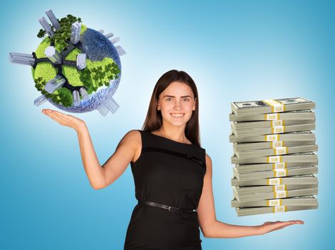 Businesswoman holding cash and earth globe, saving planet concept