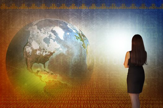 Business woman in front of holographic screen with earth globe. Elements of this image furnished by NASA