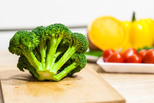 fresh broccoli closeup on background of vegetables