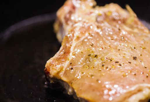 the fresh meat is fried in a skillet
