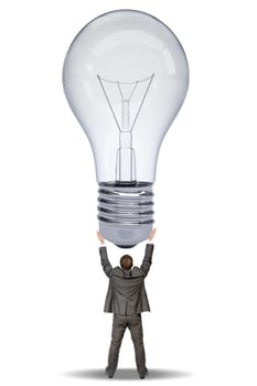 Businessman holding bulb isolated on white background
