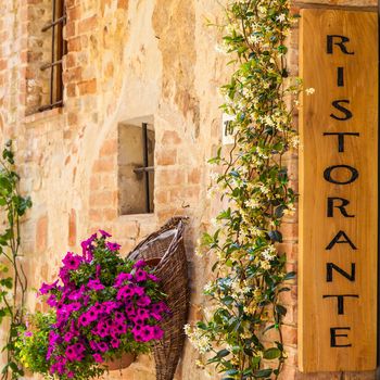 Tuscany, Italy. Sightseeing of Italian Restaurant in traditional small village in Val Orcia
