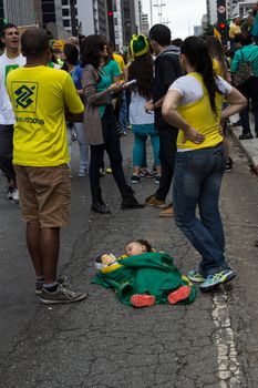 Sao Paulo Brazil March 13, 2016: One unidentified baby sleeping in the biggest protest against federal government corruption in Sao Paulo.