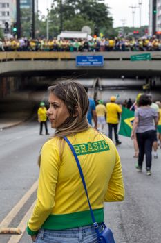 Sao Paulo Brazil March 13, 2016: One unidentified girl in the biggest protest against federal government corruption in Sao Paulo.