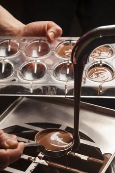 Ingredients and preparation of italian Easter milk and dark choccolate eggs and sweets