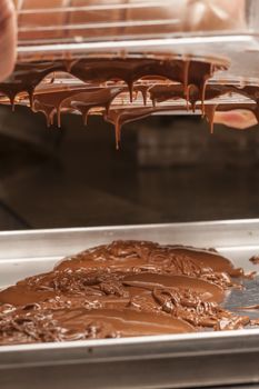 Ingredients and preparation of italian Easter milk and dark choccolate eggs and sweets