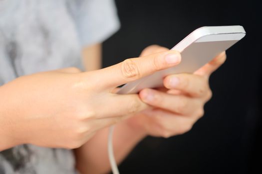 Close up of young woman using a smartphone,Social Media Life