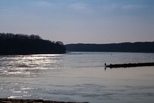 In Bratislava, Devin, on the border with Austria. border created by rivers Danube and Morava. Place of their junction. Colors of the starting sunset.