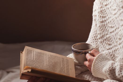 tender portrait of a young girl reading a book 