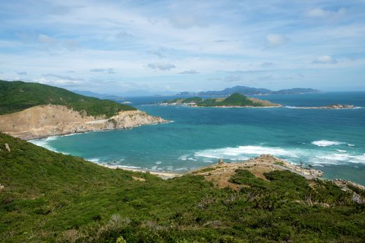 Beautiful panoramic landscape of Vietnam beach at Vinh Hy, Ninh Thuan, road along beach, small island, waves make, fresh air make fantastic holiday when travel at Viet Nam in summer or spring