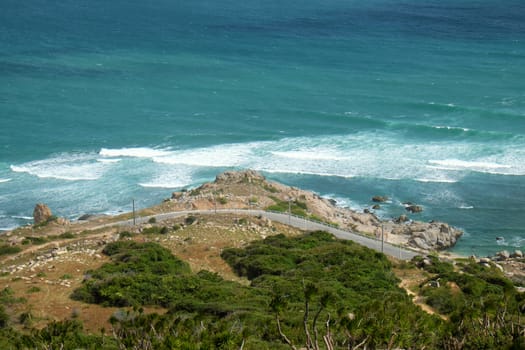 Beautiful panoramic landscape of Vietnam beach at Vinh Hy, Ninh Thuan, road along beach, small island, waves make, fresh air make fantastic holiday when travel at Viet Nam in summer or spring