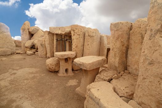 Door and window view of ancient limestone structures of Hagar Qim and Gnajdra Temples in Qrendi, Malta.