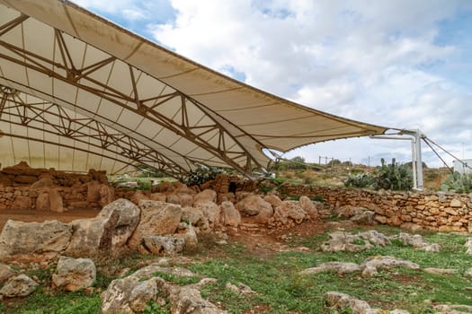 Detailed view of ancient limestone structures of Hagar Qim and Gnajdra Temples in Qrendi, Malta.