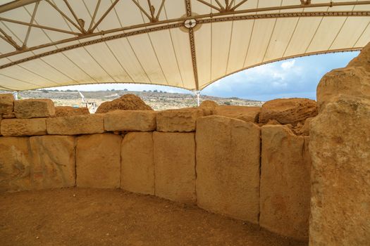 Detailed view of ancient limestone structures of Hagar Qim and Gnajdra Temples in Qrendi, Malta.