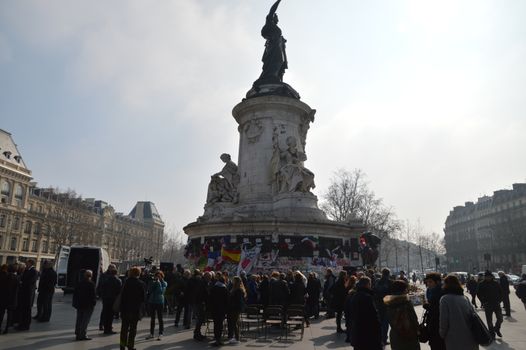 FRANCE, Paris: French relatives of victims and survivors of National Bardo Museum attack gather place de la République in Paris on March 18, 2016 to pay tribute to the 22 people killed in an attack on the National Bardo Museum in Tunis, Tunisia a year ago. 