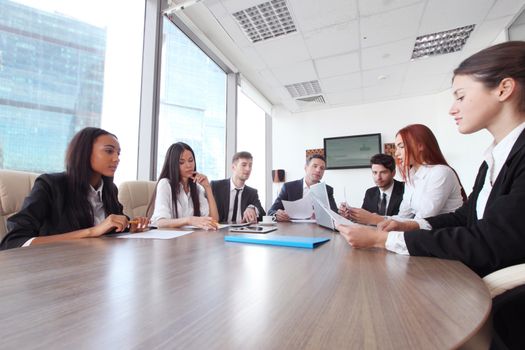 Business meeting of diverse people around the table