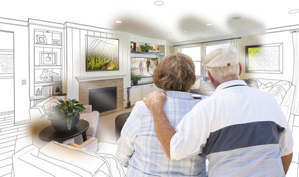 Curious Senior Couple Looking Over Custom Living Room Design Drawing Photo Combination.