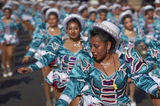 Caporales dance group performing at the annual Carnaval Andino con la Fuerza del Sol in Arica, Chile.