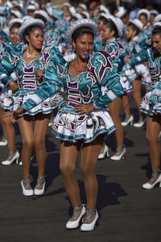 Caporales dance group performing at the annual Carnaval Andino con la Fuerza del Sol in Arica, Chile.