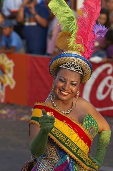 Morenada dancer in traditional Andean costume performing at the annual Carnaval Andino con la Fuerza del Sol in Arica, Chile.