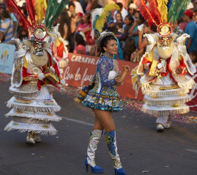 Morenada dancer in traditional Andean costume performing at the annual Carnaval Andino con la Fuerza del Sol in Arica, Chile.