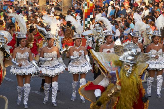 Morenada dance group in traditional Andean costumes performing at the annual Carnaval Andino con la Fuerza del Sol in Arica, Chile.