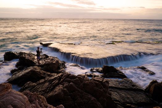 Wonderful seascape at Nui Chua national park, Ninh Thuan, Viet Nam, waves on large rock and make amazing fall in Hang Rai at sunrise, amazing landscape at Vietnam beach, masterpiece place for travel