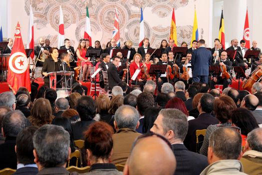 TUNISIA, Tunis : The Tunisian Symphony Orchestra performs during a memorial ceremony at the Bardo museum in Tunis on March 18, 2016, marking the first anniversary of a jihadist attack on the museum.