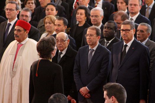 TUNISIA, Tunis : Tunisian Prime Minister Habib Essid (R) attends a memorial ceremony at the Bardo museum in Tunis on March 18, 2016, marking the first anniversary of a jihadist attack on the museum.