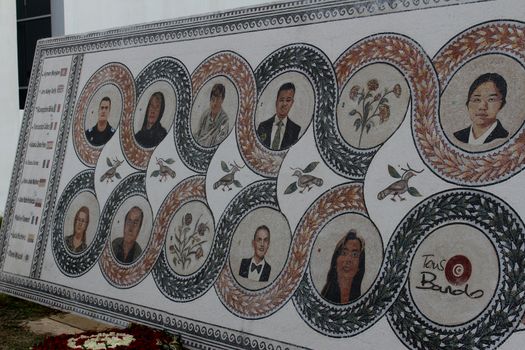 TUNISIA, Tunis: A memorial is on display at the Bardo National Museum in Tunis on March 18, 2016, commemorating the one-year anniversary of the terror attack there. The assault by Islamic State militants left 24 people dead that day in 2015. The pictured memorial bears the victims' faces. 
