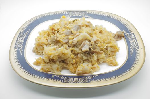 Stir fried noodle with pork in dish