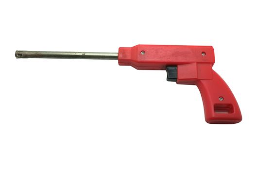 Red gas lighter in shape of gun isolated on white background
