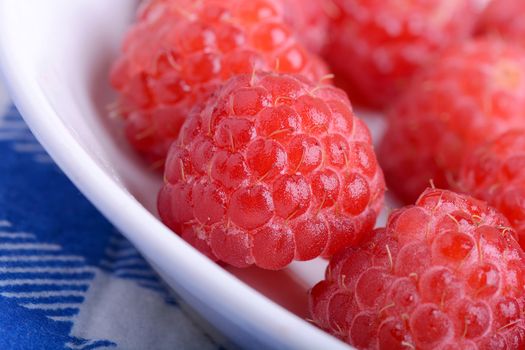 Fresh sweet raspberries close up