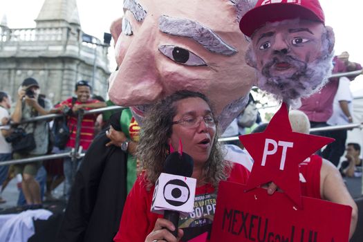 BRAZIL, Rio de Janeiro : Workers' Party (PT) supporters demonstrate in support of President Dilma Rousseff and former President Luiz Inacio Lula da Silva in Rio de Janeiro, Brazil, on March 18, 2016. Brazilian President Dilma Rousseff's supporters took to the streets Friday to fight back at attempts to oust her, as a flurry of court battles raged over her controversial cabinet appointment of predecessor Luiz Inacio Lula da Silva.
