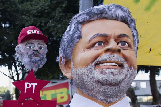 BRAZIL, Rio de Janeiro : Workers' Party (PT) supporters demonstrate in support of President Dilma Rousseff and former President Luiz Inacio Lula da Silva in Rio de Janeiro, Brazil, on March 18, 2016. Brazilian President Dilma Rousseff's supporters took to the streets Friday to fight back at attempts to oust her, as a flurry of court battles raged over her controversial cabinet appointment of predecessor Luiz Inacio Lula da Silva.