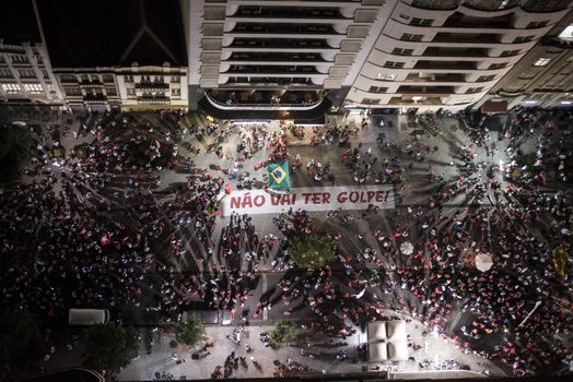 BRAZIL, Curitiba: A group of pro-government protesters demonstrate in support of President Dilma Rousseff and former President Luiz Inacio Lula da Silva in Curitiba, Brazil, on March 18, 2016. Brazilian President Dilma Rousseff's supporters took to the streets Friday to fight back at attempts to oust her, as a flurry of court battles raged over her controversial cabinet appointment of predecessor Luiz Inacio Lula da Silva. 