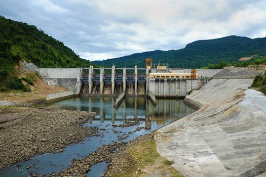 Song Bung hydroelectric plant on Ho Chi Minh trail, at Quang Nam, Viet Nam, large spillway and water reservoir to product energy for industry